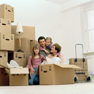 family with moving boxes